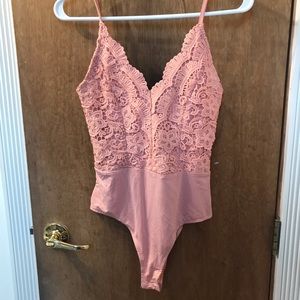 Blush pink lace bodysuit